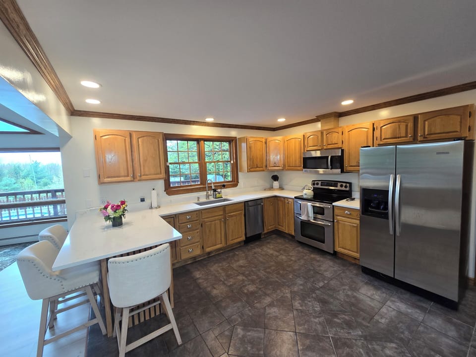 Enjoy our large kitchen with stainless steel appliances