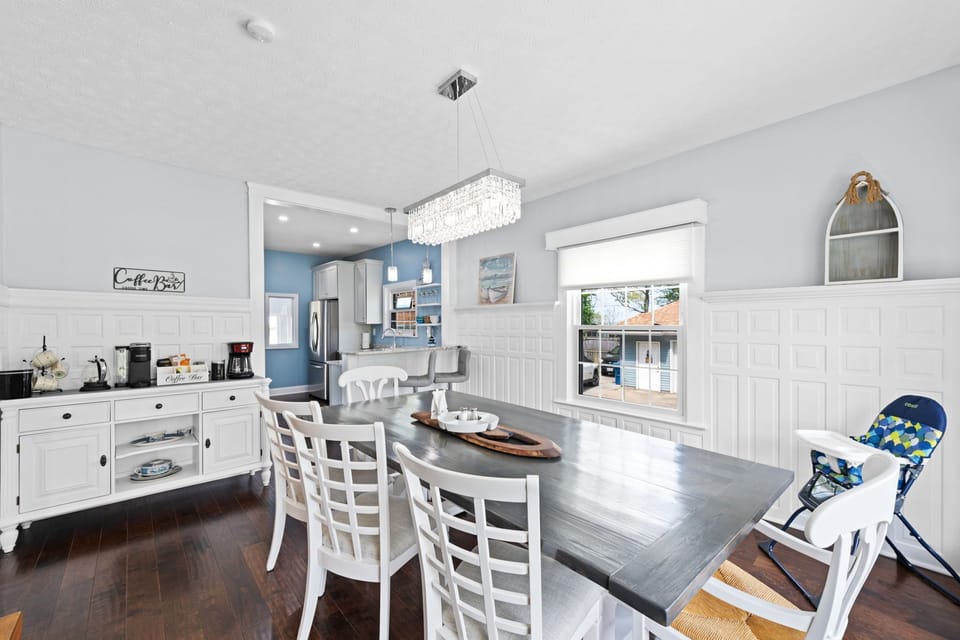 Coastal glam vibe, with total seating of 11, including the bench.