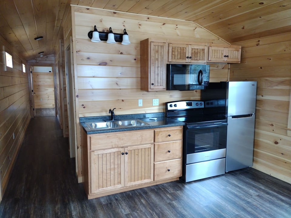 Kitchenette with full size stove.