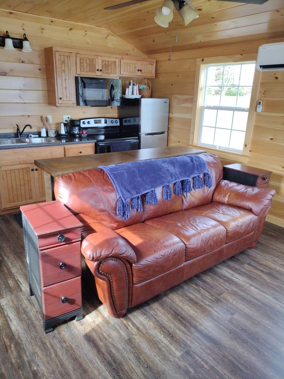 Kitchenette, dining area and living room.