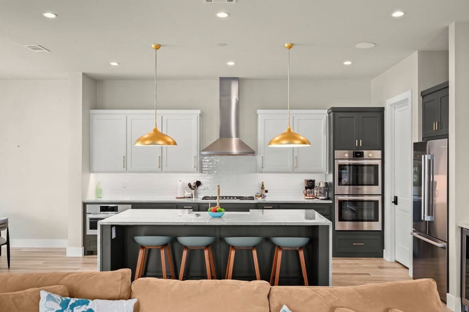 Kitchen and waterfall island from living room.