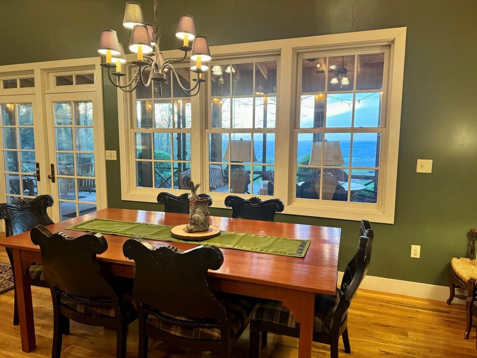 Dining area with a view over the bluff. Right off the kitchen.