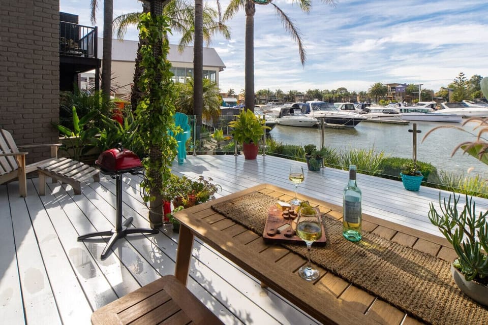 Ground level Outdoor dining on the deck. Enjoy a wine and blissful ambiance.