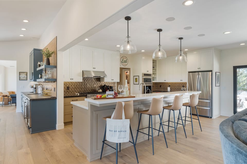 The kitchen features top-of-the-line appliances.