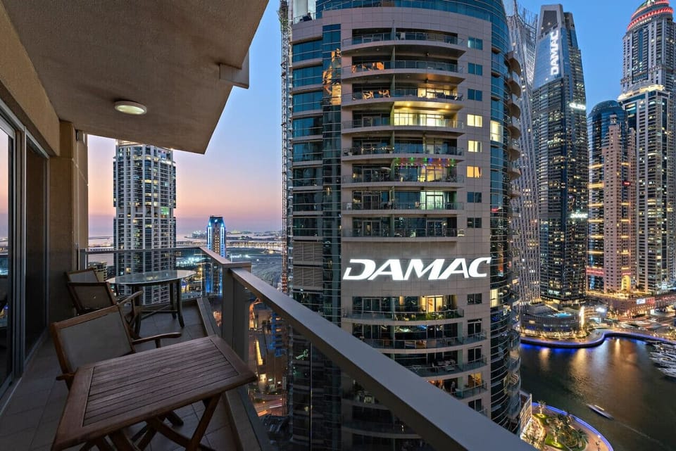 Balcony Retreat: Enjoy stunning skyline views from your private outdoor oasis. Perfect for sunset sips!