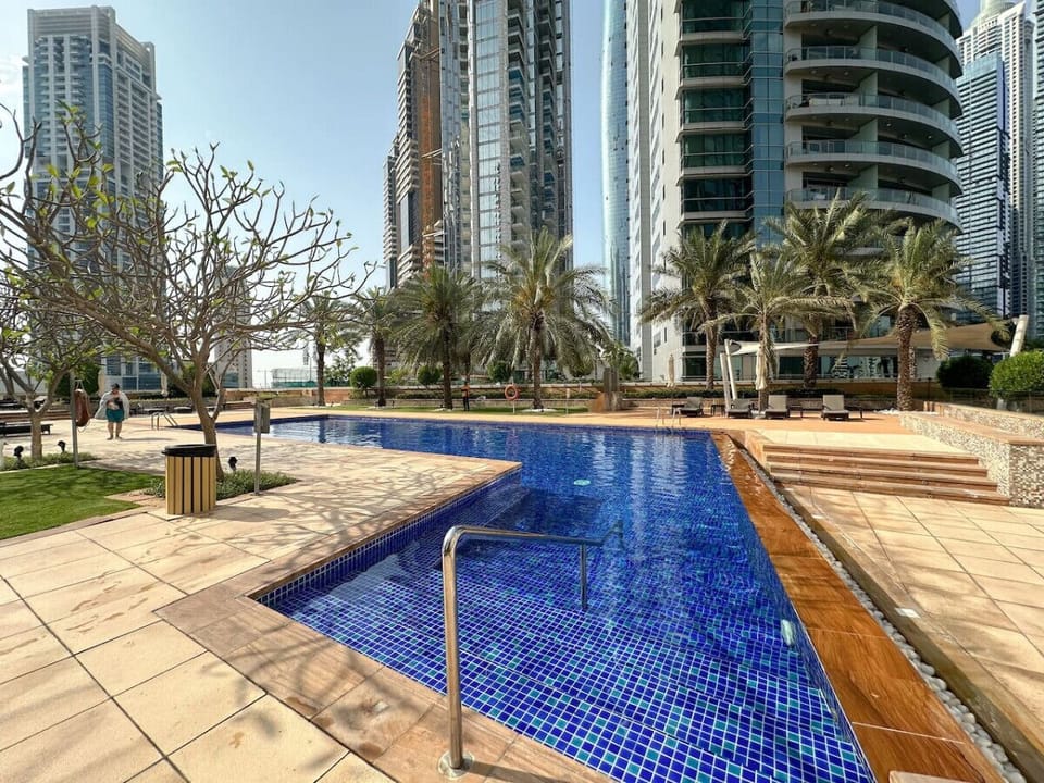 Pool Paradise: Dive into luxury with stunning views and sparkling waters just steps away!