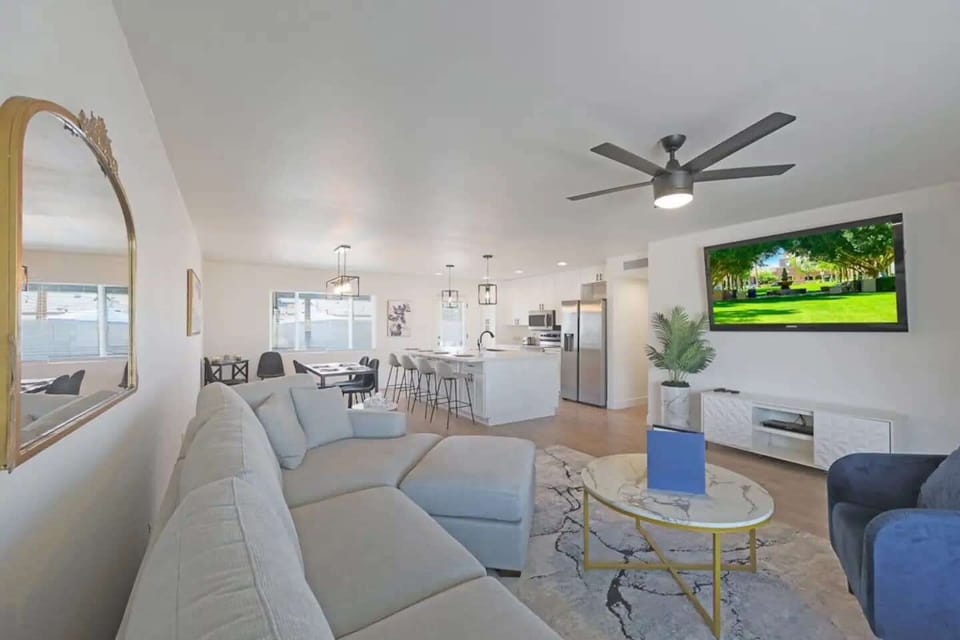 The open design concept makes the house great for socializing with the whole crew! Easy access to the kitchen and an easy view of the big screen TV!