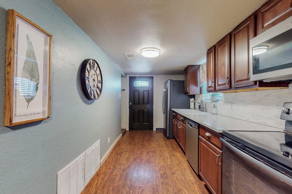 Full kitchen with refrigerator electric stove, dishwasher, microwave and Keurig