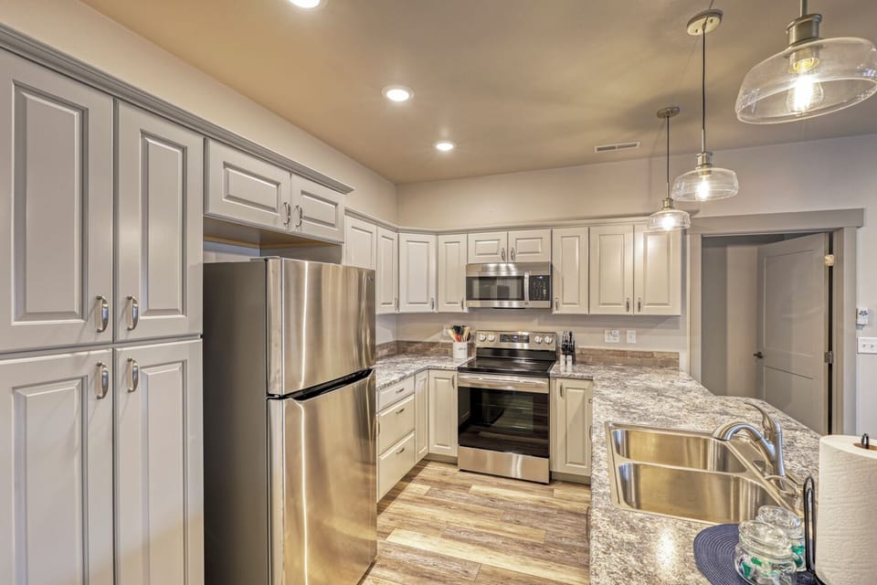 Kitchen with modern appliances, ample counter space, and high-quality essentials, makes meal preparation effortless and enjoyable.