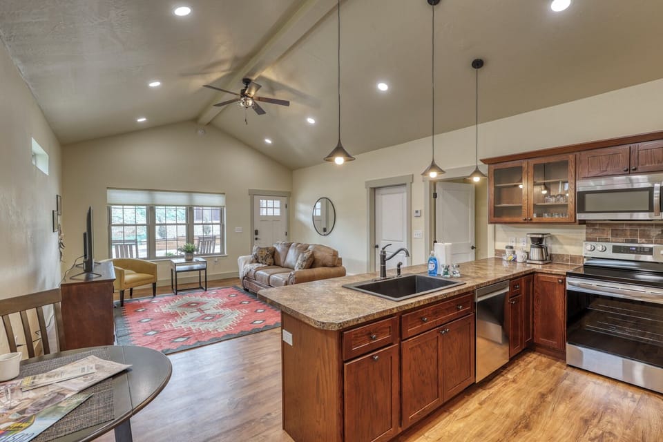 Our open concept condo allows for relaxation, fostering an environment where you can seamlessly unwind and relax. The layout, with its interconnected living, dining, and kitchen areas, provides ample space to move freely and enjoy life's moments without the constraints of walls. 
