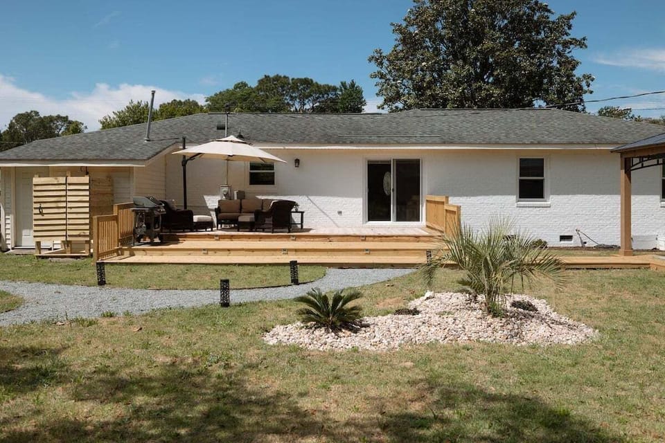 A spacious deck ideal for lounging, reading, or enjoying the coastal breeze. Great for families and pets.
