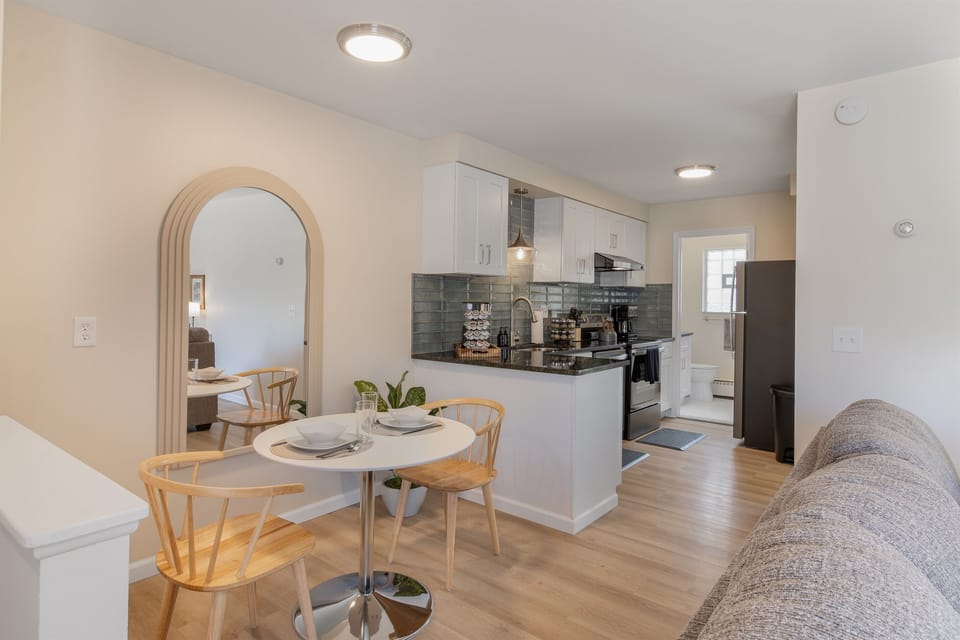 Sleek modern kitchen with classic touches, designed for both style and functionality.