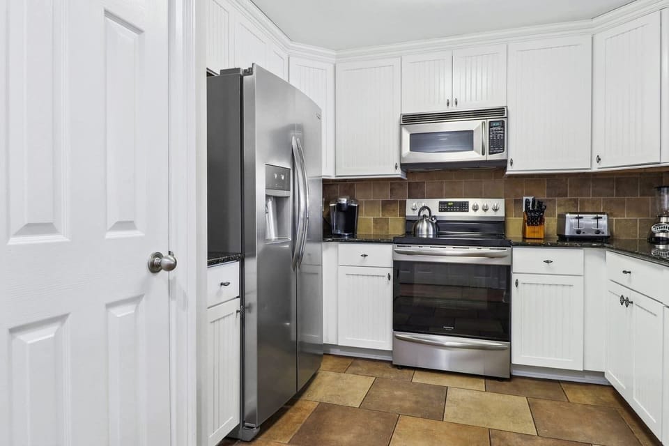 Kitchen with stainless appliances.