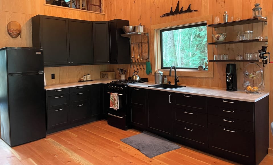 Full kitchen with new appliances, pots, pans, baking supplies etc.