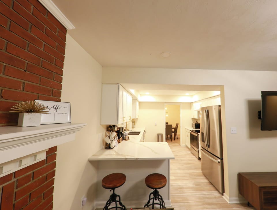 Stainless steel appliances beckon to the modern chef.