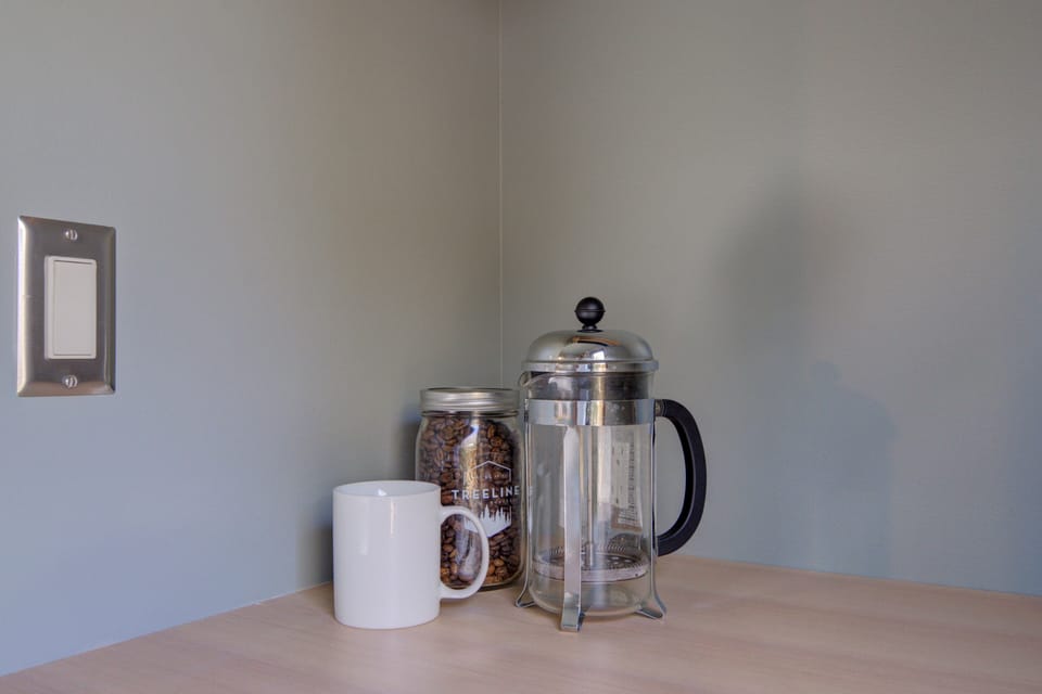 French press and locally roasted coffee beans