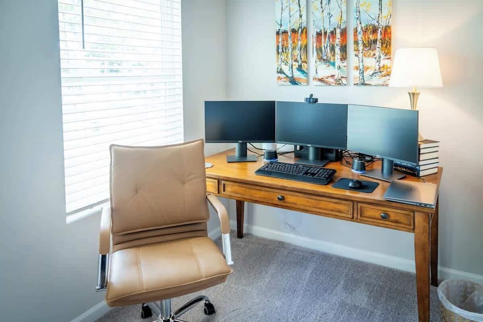 The master suite also has a dedicated workstation so you can keep WFH...at the lake!