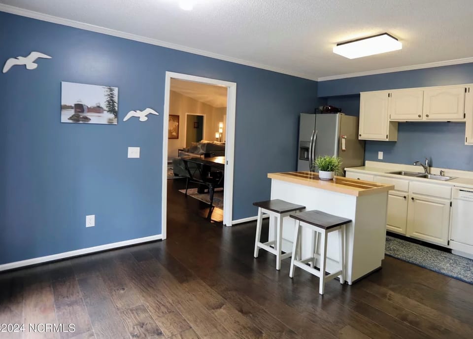 Full kitchen w/ Coffee bar, French Press, Keurig, access to back deck and garage