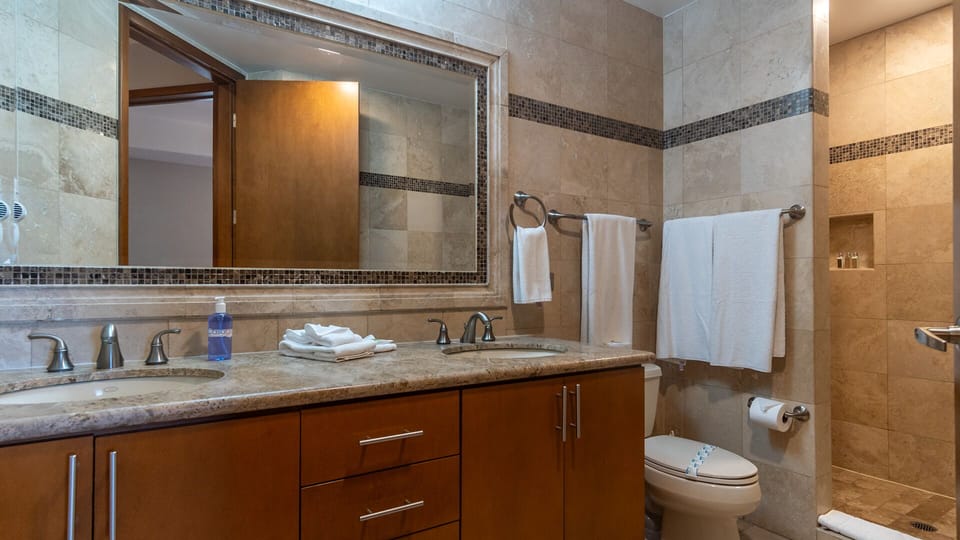 spacious tiled bathroom