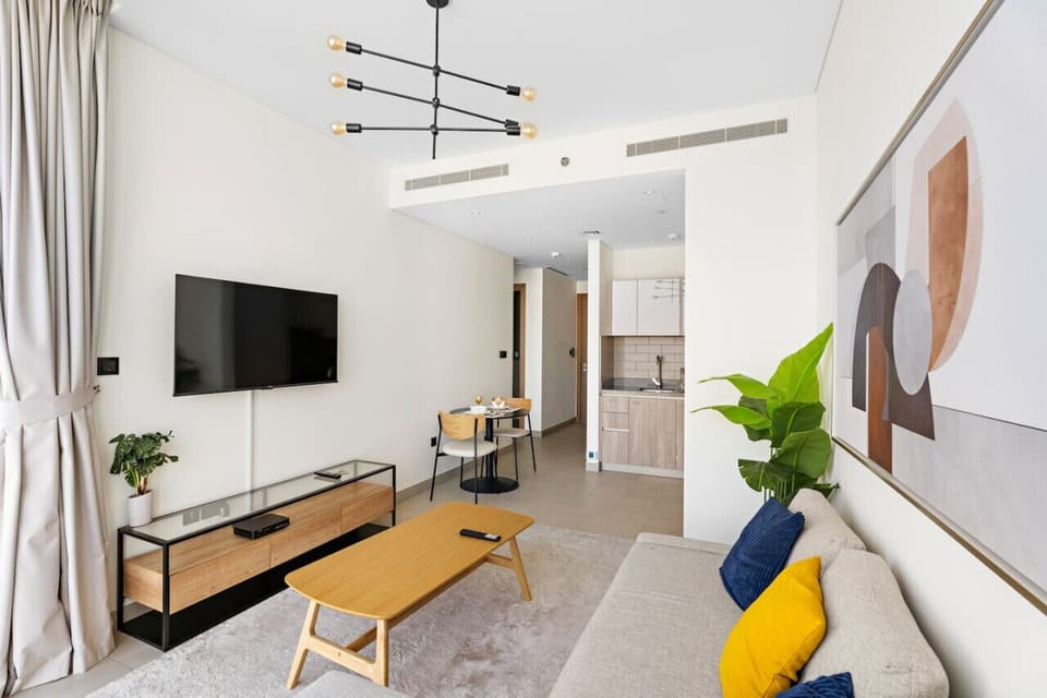 Living Room: Stylish decor and vibrant colors set the stage for relaxation and fun!