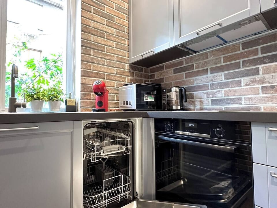 Luxury Sofia Retreat | Central Location | 2BR | Designer Decor | Smart TVs | Queen Beds | Washer & Dryer | Fast WiFi | Fully Equipped Kitchen | Tranquil Balcony | Metro Access | Explore Vitosha | National Palace of Culture Park | Best Sofia Airbnb