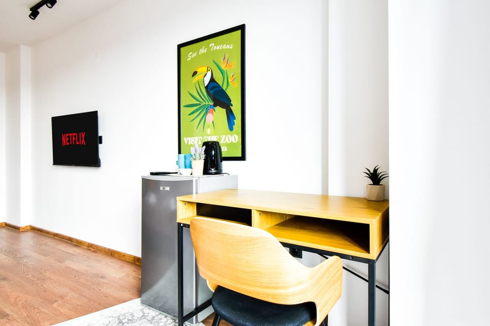 #SofiaSharedCharm
#CityscapeTerraceViews
#PastelRetreatSofia
#SharedLuxuryLiving
#CozyCommunalExperience