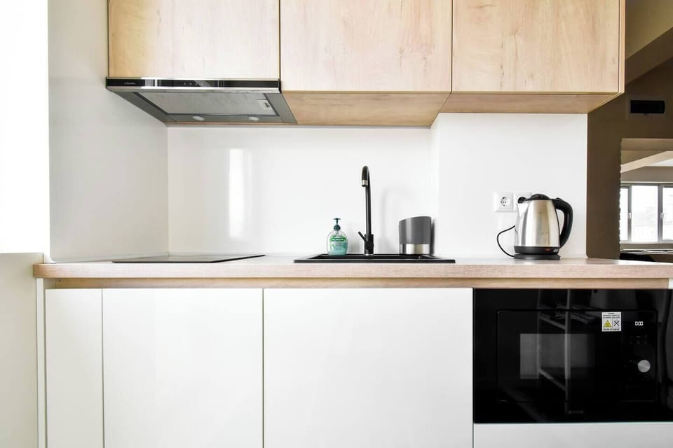 Culinary delight: A fully equipped kitchen with modern appliances, including a Nespresso machine and dishwasher, for gourmet experiences.