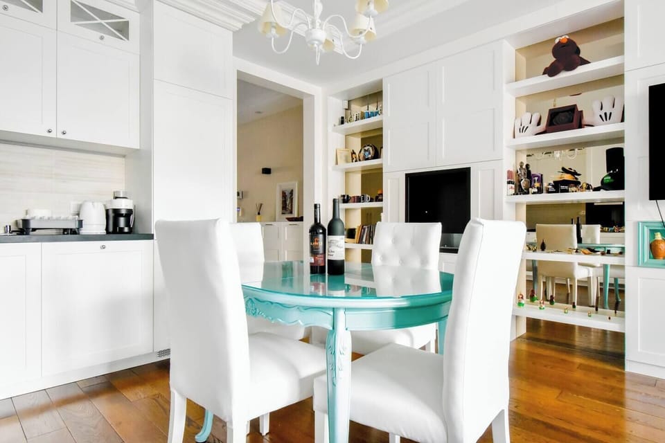 Bask in the natural light streaming through large windows, highlighting the fine details and luxurious furnishings.