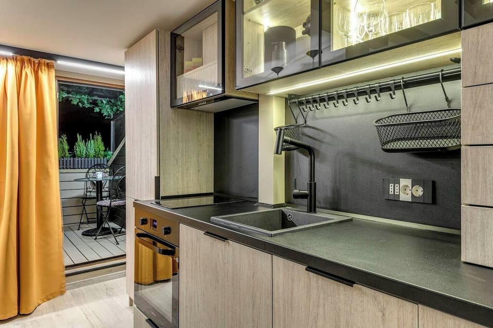Open and inviting, this cozy living area flows seamlessly into a fully equipped kitchen – perfect for lounging and dining. 🍽️ Check for Availability!