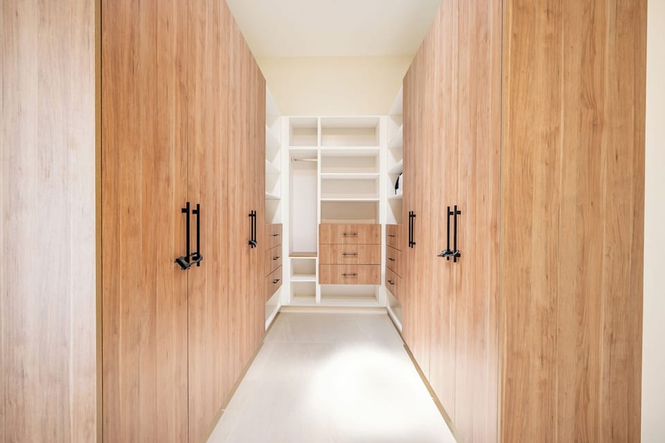 Unpack or simply store luggage in our walk-in closet space to keep your surroundings tidy and organized!