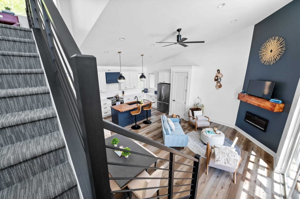 Bright living area with stairs