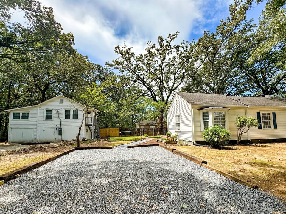 Left side: Carriage House -Right Side: Main House (four parking spots total)