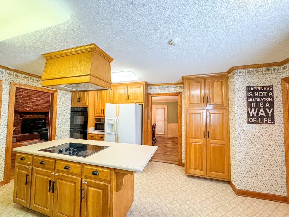 A double oven and large pantry makes this room a chef's favorite!