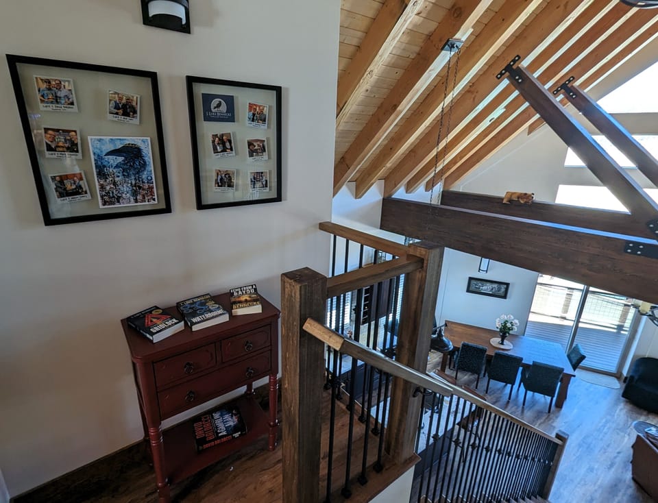 Author corner on 3rd floor showcases celebrity photos and author-owner books.