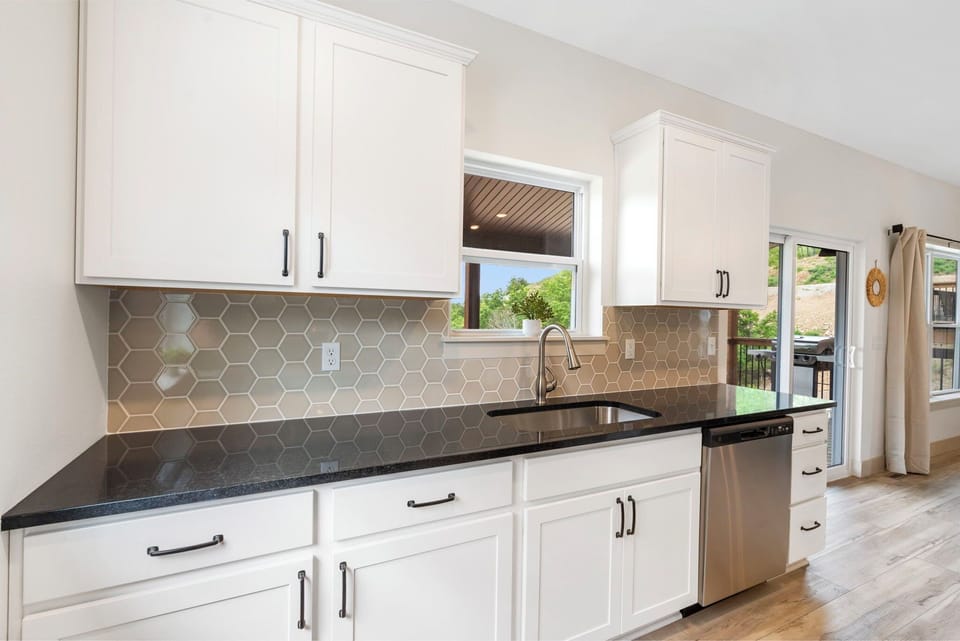 The open kitchen is the perfect place to prepare a meal to share.