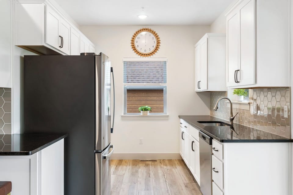 The fully stocked kitchen offers everything you need to whip up meals to share.