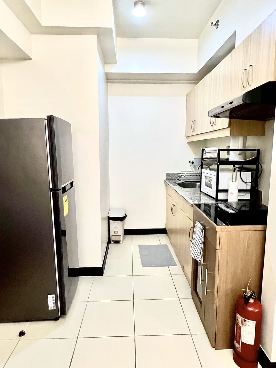 Our space includes basic cookware, utensils, a microwave & a fridge.
