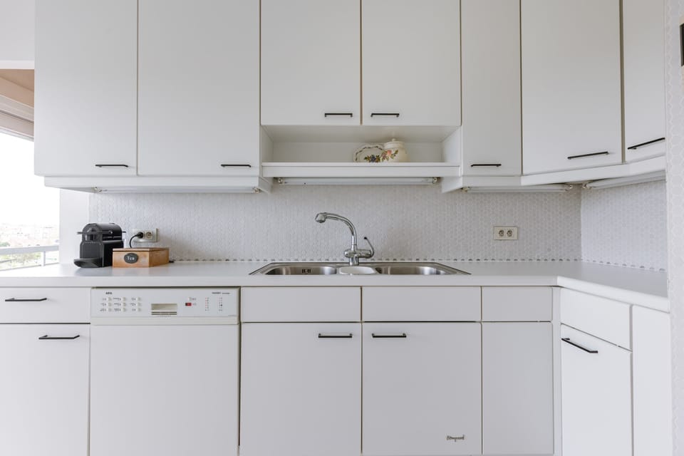 Kitchen with coffee machine
