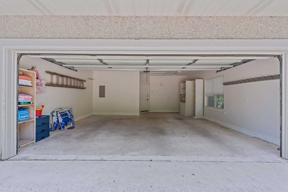 Two car garage for parking and complimentary beach chairs, towels, totes and coolers for your use