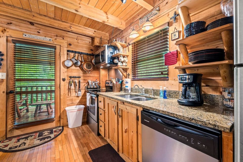 There is also a full suite of stainless steel appliances including an oven, dishwasher, microwave and refrigerator.