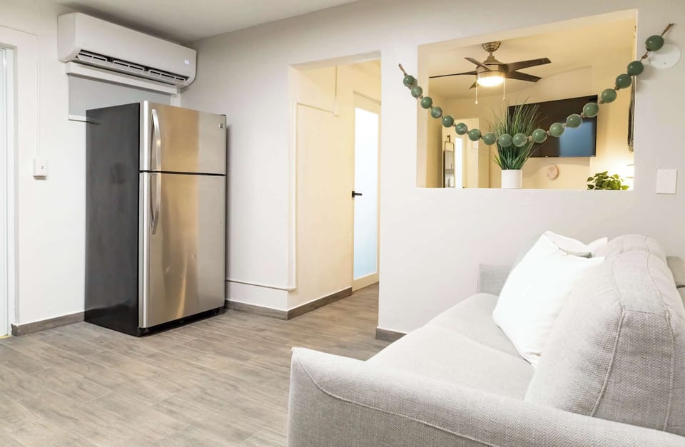 Large refrigerator in kitchen / dining area