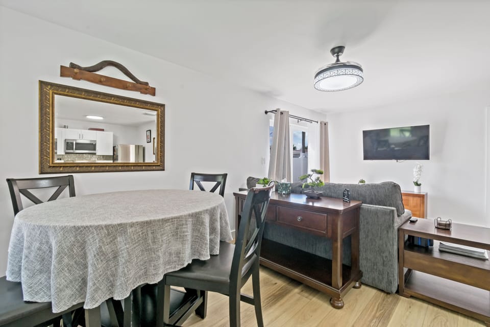 Dining table expands and contracts. Open / great room style living space.