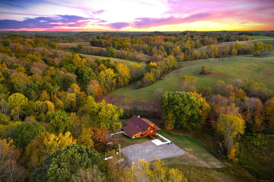 Private 22‑acre wooded setting with peaceful rolling hill views and total Hocking Hills seclusion.