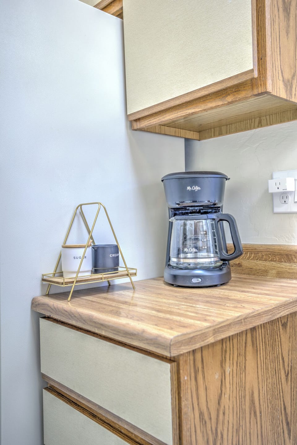 Kitchen with Coffee Maker, Cream and Sugar