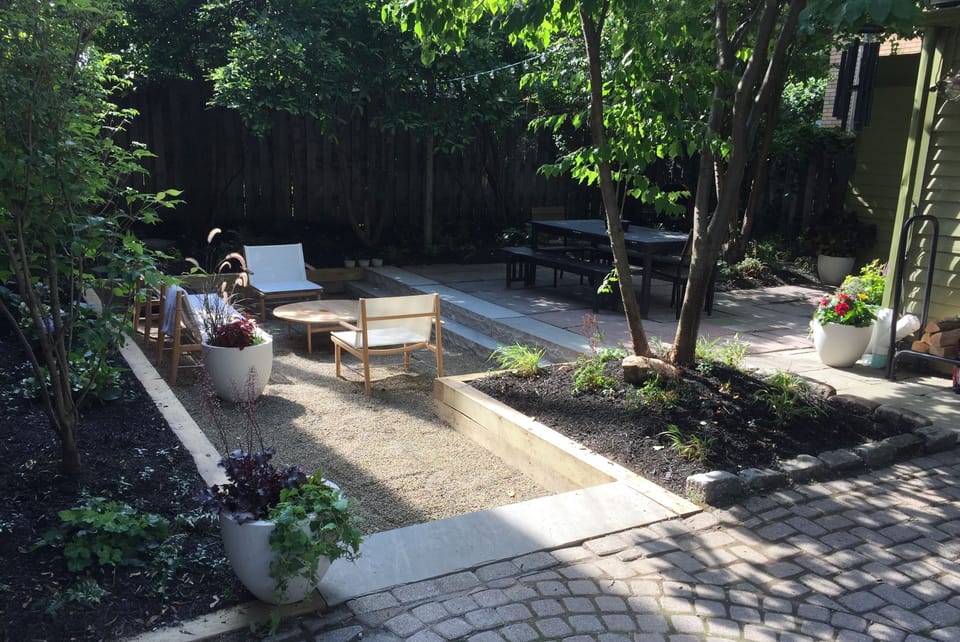 Peaceful backyard garden w/ picnic table, BBQ grill, fire pit, furniture, herbs