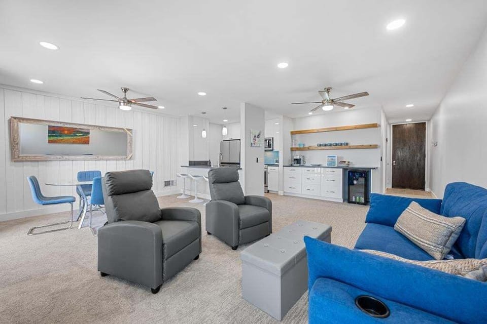 Spacious living room with plenty of seating with 2 comfortable leather recliners