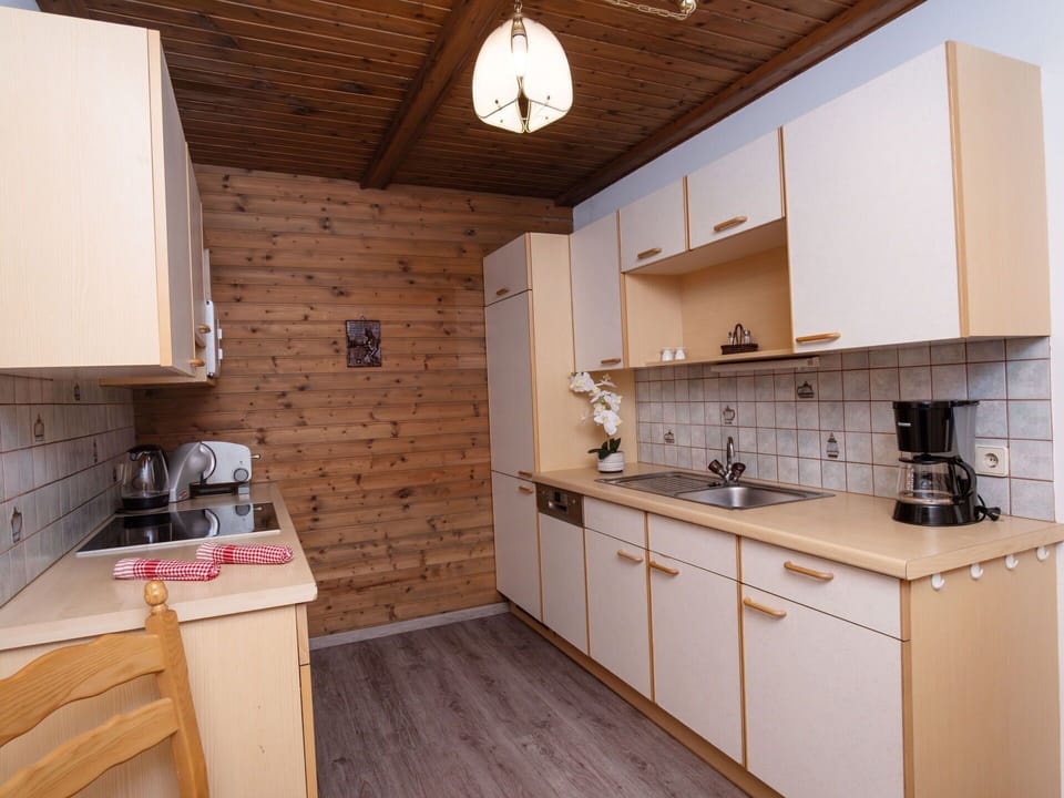 Cabinetry, Furniture, Countertop, Sink, Wood, Kitchen Stove, Tap, Kitchen, Lighting, Interior Design