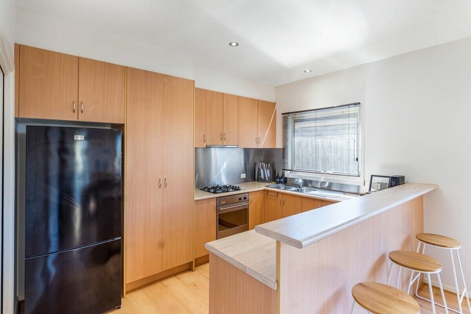Fully-equipped kitchen with all the appliances you need for a comfortable stay.