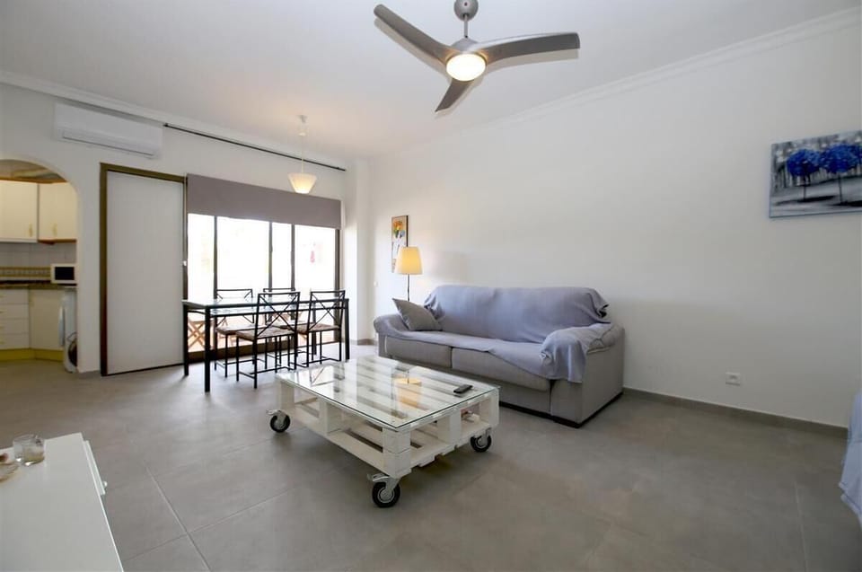 Lounge from a different angle and dining area to the rear