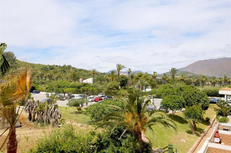 More views from the terrace to the gardens and mountains